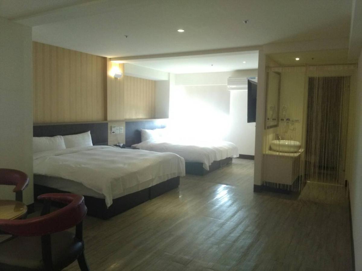 Dengfeng Milan Business Hotel Huwei Bagian luar foto