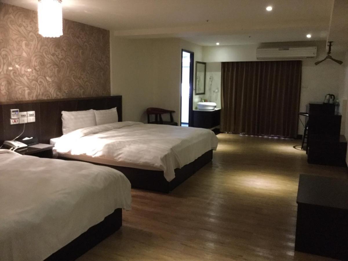 Dengfeng Milan Business Hotel Huwei Bagian luar foto