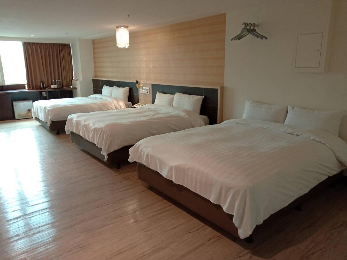 Dengfeng Milan Business Hotel Huwei Bagian luar foto
