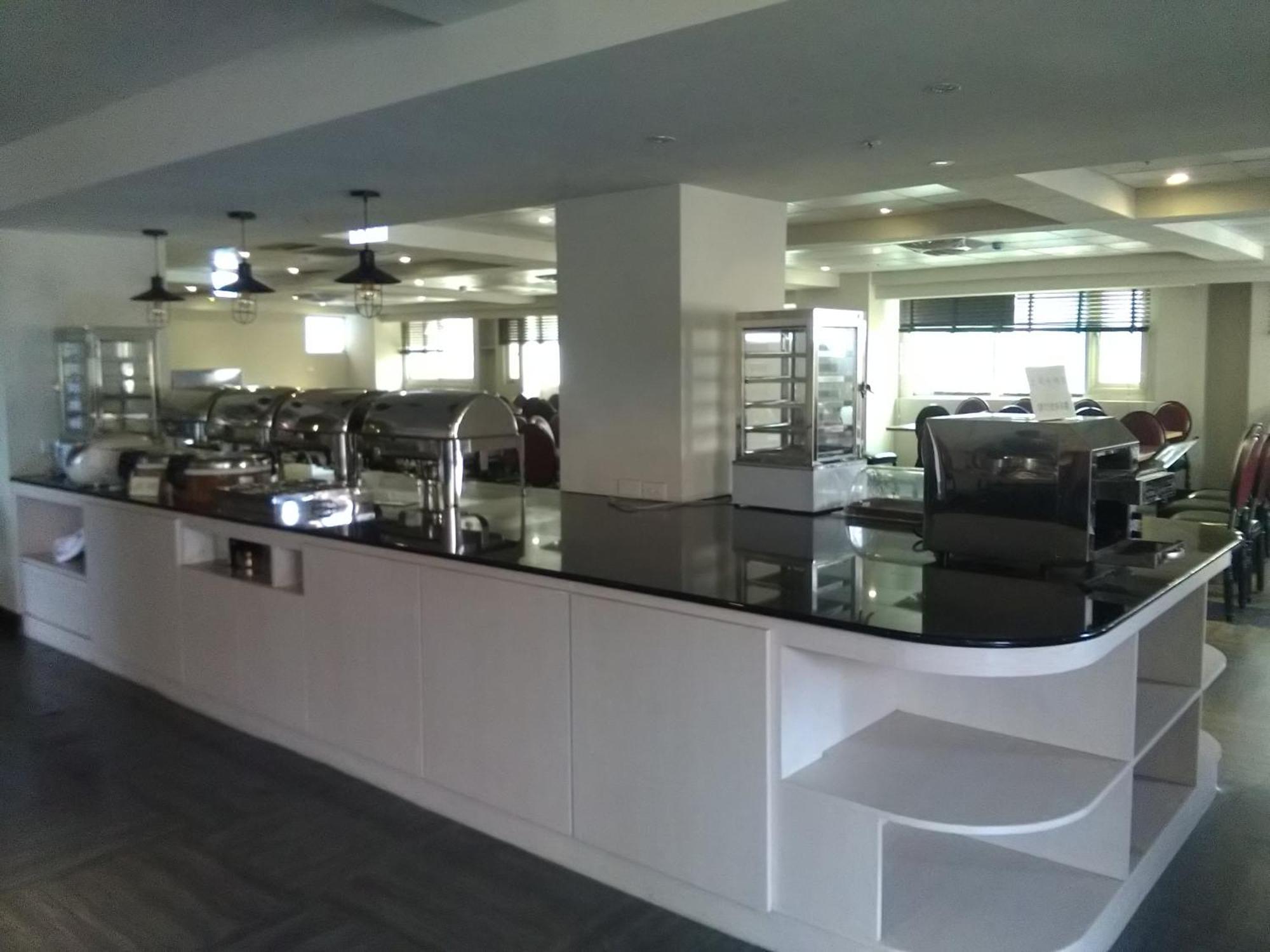 Dengfeng Milan Business Hotel Huwei Bagian luar foto
