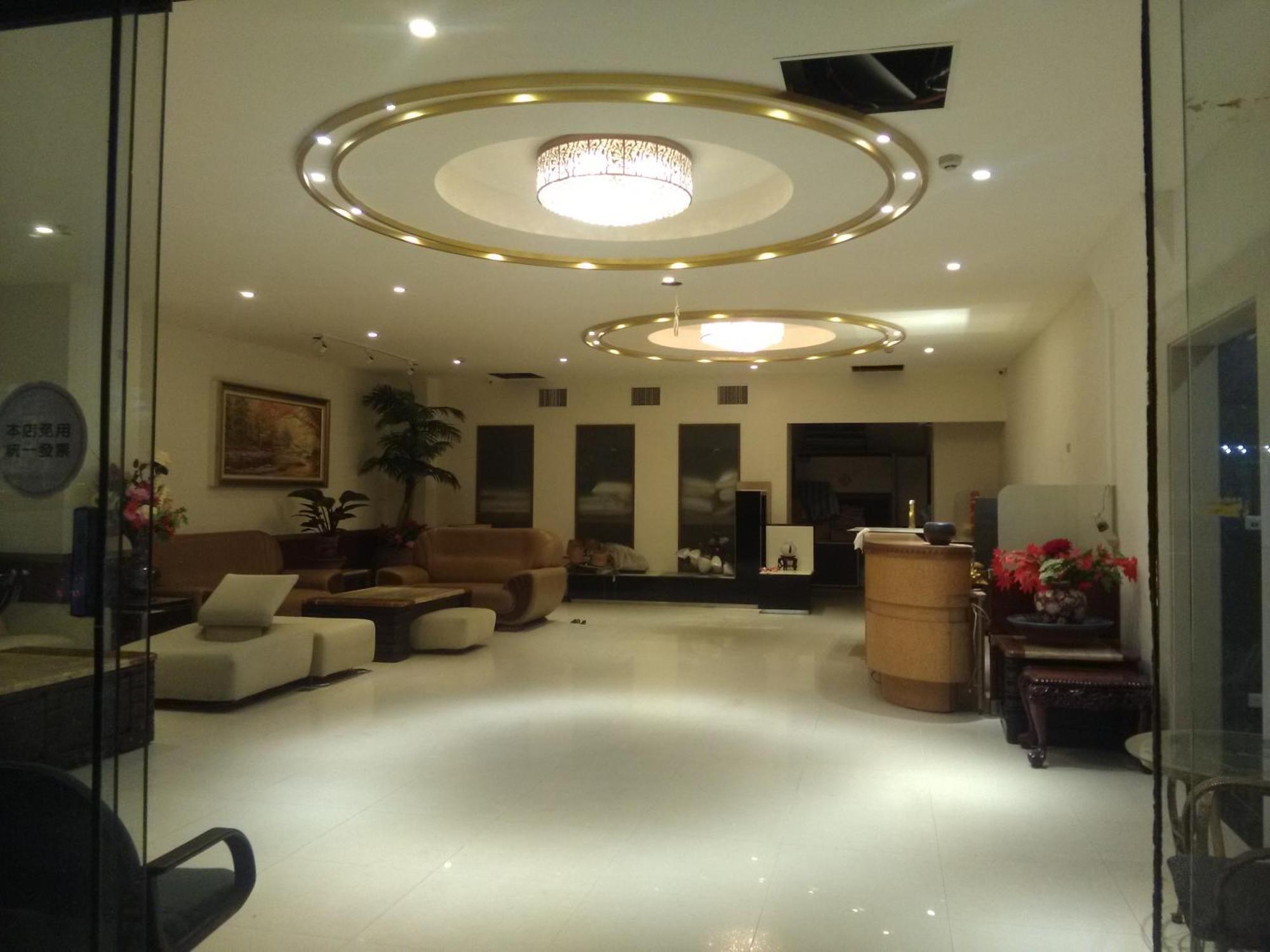 Dengfeng Milan Business Hotel Huwei Bagian luar foto