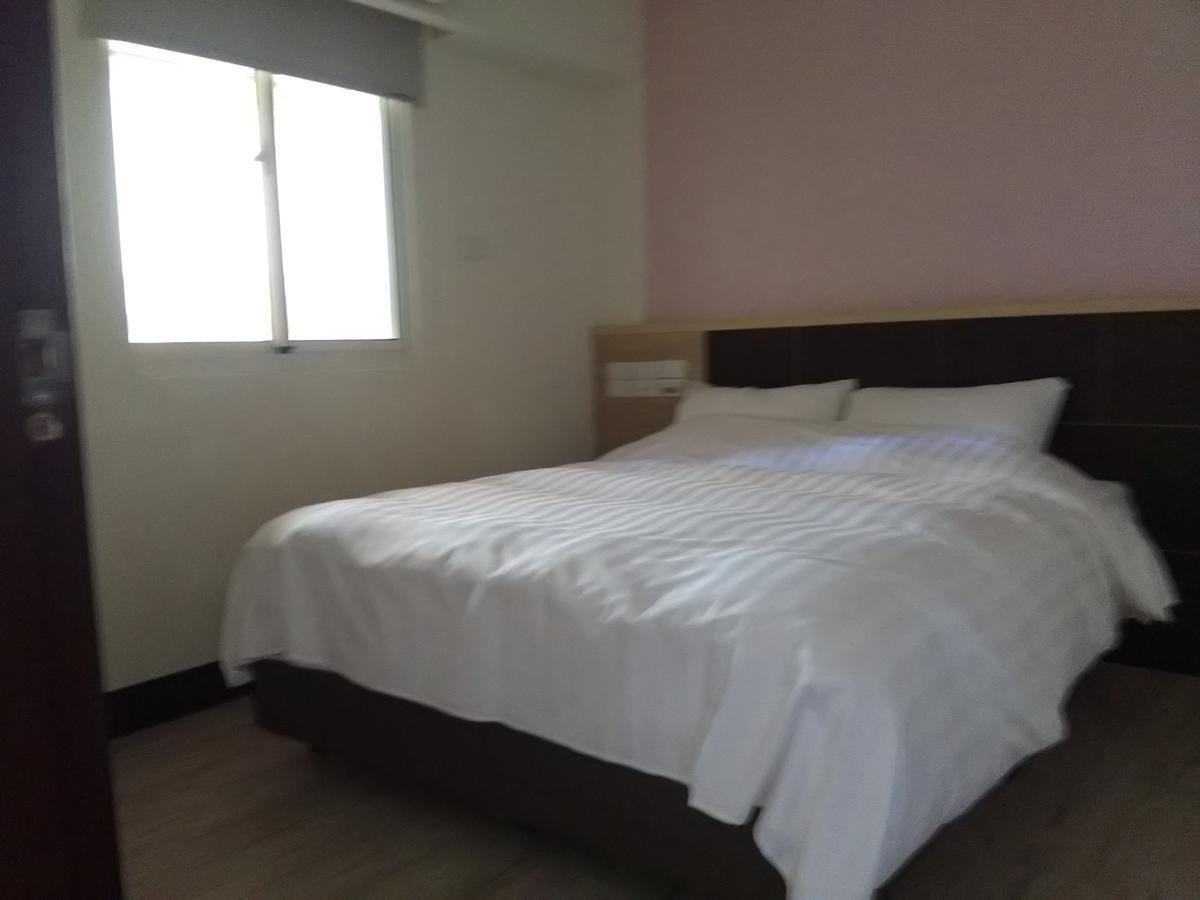 Dengfeng Milan Business Hotel Huwei Bagian luar foto