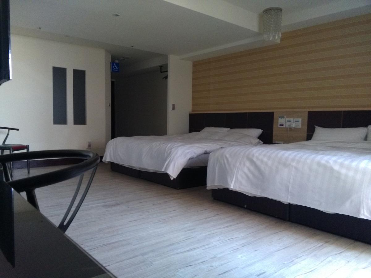 Dengfeng Milan Business Hotel Huwei Bagian luar foto